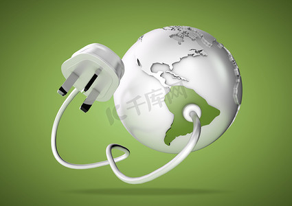 初见like摄影照片_Electrical cable and plug connects power to South America on a world globe. Concept for how Brazil and Argentina consume electricity and energy and how they need to use renewable, green, alternative energy solutions like solar & wind turbine energy.