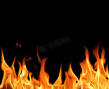 地狱之火摄影照片_黑色背景的火焰