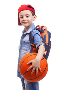 背包猪摄影照片_学校孩子拿着篮球