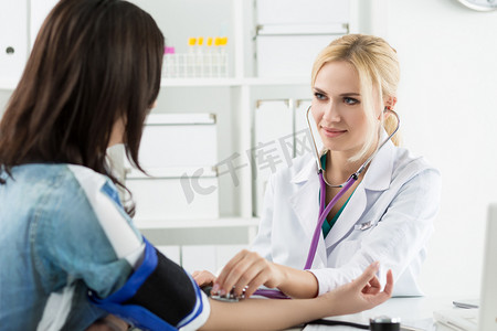 Medicine doctor measuring blood pressure to patient