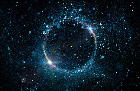 高光粒子摄影照片_圆-抽象黑洞中的闪光粒子