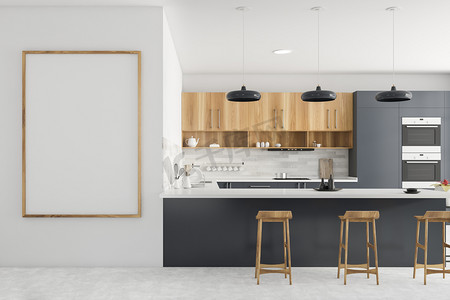 现代化厨房的内部，有灰白色的墙壁，灰色的台面，木制的橱柜，有凳子的酒吧，两个烤箱和垂直的模型海报框架。3d渲染