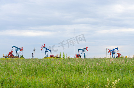 Oil production on the background of sky