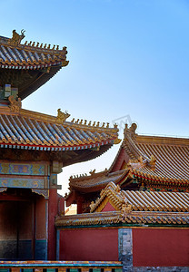 古代建筑摄影照片_中国古代建筑。蓝色天空下的历史性建筑。美丽的传统模式。北京的皇宫