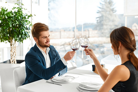 Celebration. Romantic Couple In Love Cheering, Having Dinner. Re