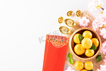 中国新年装饰品或红包、橙子 