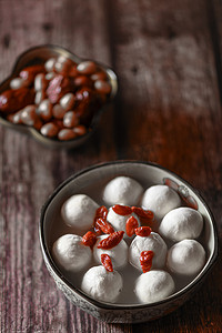 tangyuan摄影照片_Tangyuan ,Red dates , peanuts, red dates, Wolfberry  on the table 