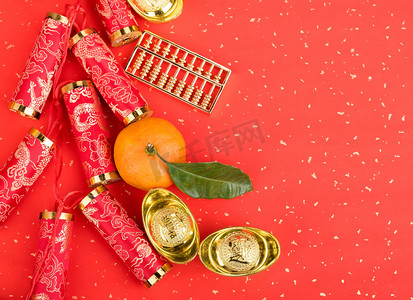 本周热点摄影照片_中国新年装饰品--金锭、橙子、金币、金算盘、书法翻译：新年吉祥