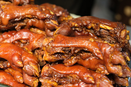 close up stack of pot-stewed pig's trotters. traditional Chinese food