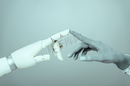 裁剪拍摄的机器人触摸机器人手臂隔离在灰色, 未来的技术概念