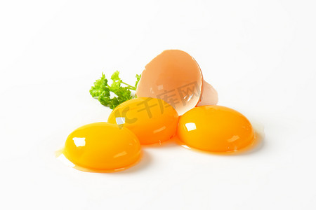 蛋黄白玉菇摄影照片_生鸡蛋蛋黄