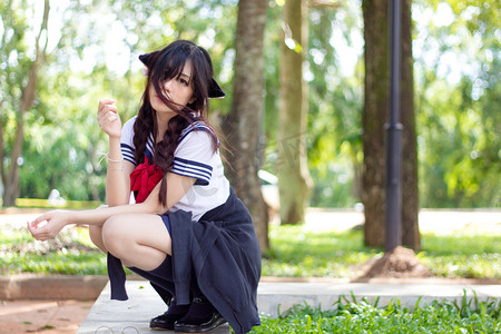 uniform摄影照片_Asian school girl with charming eyes