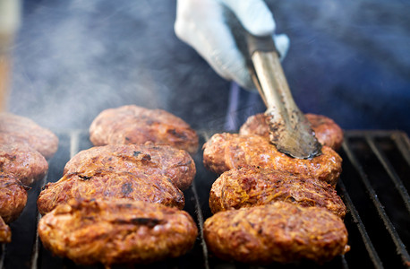 Chef checking meat