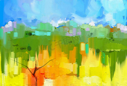 season摄影照片_Abstract colorful oil painting landscape on canvas. Semi- abstract image of tree in yellow and green field with blue sky.Spring season nature background