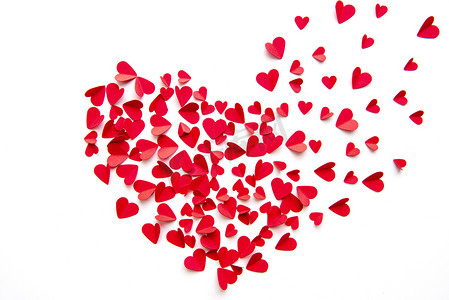 大红色浪漫摄影照片_红色的心在一颗被白色隔离的大心脏中聚集 