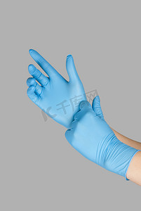 医疗清洁摄影照片_蓝色手套