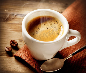 蒸汽机摄影照片_咖啡浓缩咖啡。咖啡杯