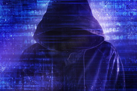 Cybersecurity, computer hacker with hoodie