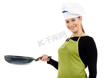 料理机摄影照片_女厨师拿着炒锅