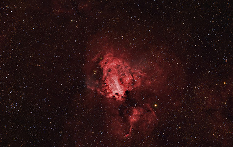 黑深红色摄影照片_射手座星座天文摄影: 欧米加星云