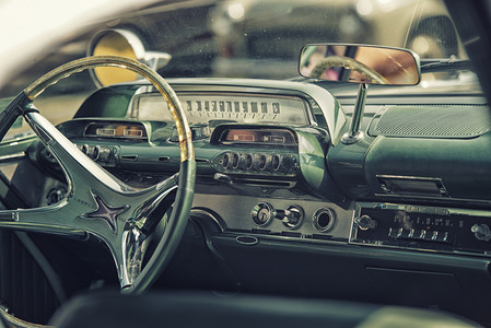 Sleza, Poland, August 15, 2015: Close up on old vintage car steering wheel and cockpit on  Motorclassic show on August 15, 2015 in the Poland