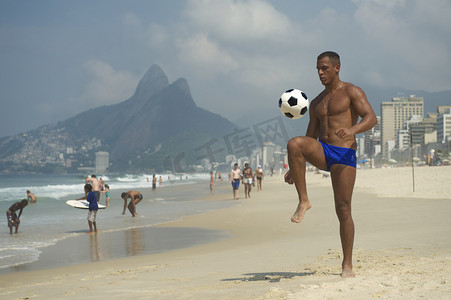 Young Brazilian Man Playing Altinho Beach Football