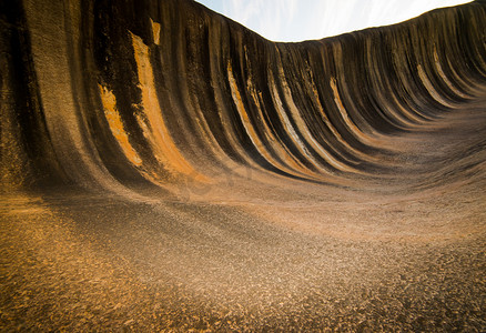 风化岩摄影照片_澳洲的海浪石