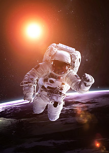 宇航员航空摄影照片_宇航员在外层空间行星背景