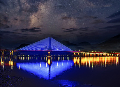 英德仙湖摄影照片_英德北江江湾大桥灯光夜景摄影图配图