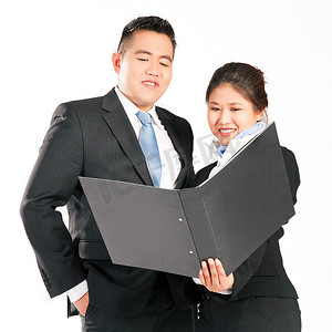 亚洲商务人士学习文件夹？生意经营得很好。