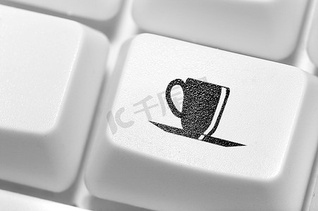键盘上有一杯咖啡标志的按钮。工作休息时间。