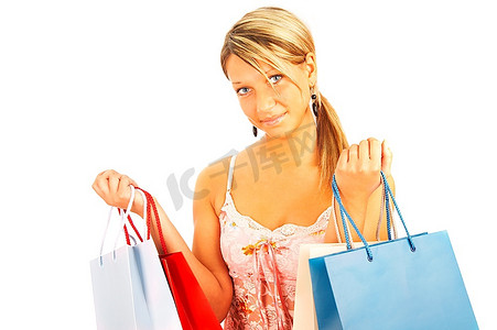 红色拎包摄影照片_拎着包的女孩--比较购物。大减价！