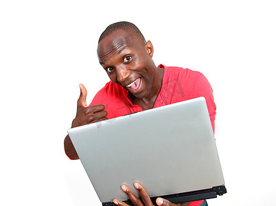 快乐的男人在白色背景上带着笔记本电脑