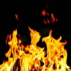 地狱摄影照片_黑色背景上的地狱火焰火焰特写