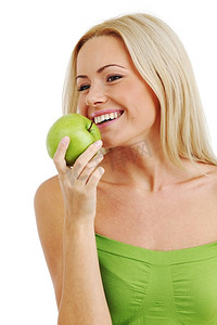 金发女人吃白苹果上的青苹果