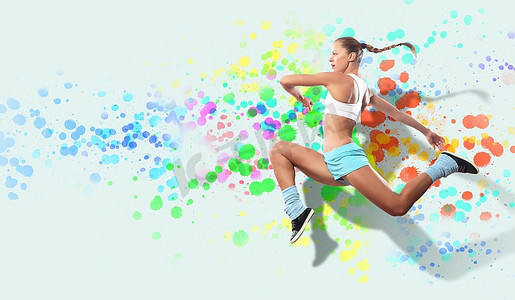 图像的运动女孩在跳跃反对彩色斑点背景