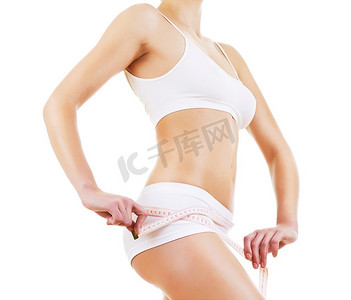 健康运动的体型和白色背景下的白色尺寸