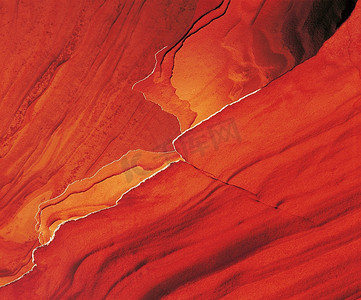 红色侵蚀摄影照片_侵蚀砂岩层的边缘