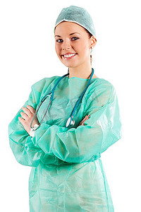 身穿绿色手术服的护士在镜头前看着白色