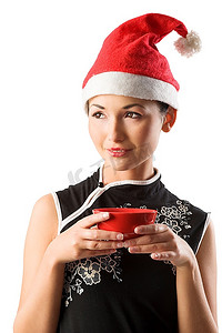 亚洲圣诞老人女孩手持中国传统红杯米饭