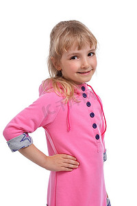 可爱的小女孩穿着粉色连衣裙的工作室照片