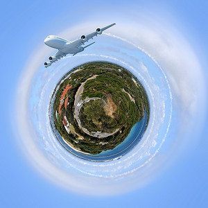 城市绕地球摄影照片_天空背景下的行星地球和绕其飞行的飞机