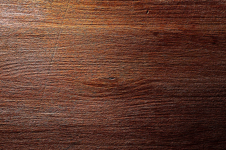 棕色木材摄影照片_深棕色木质纹理背景