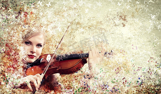 维奥拉摄影照片_拉小提琴的漂亮女人
