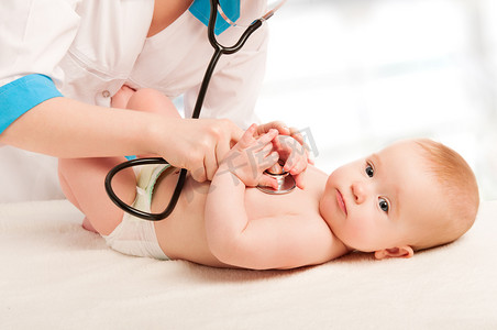 Pediatrician doctor and patient - small child