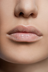 唇牙摄影照片_美丽的女性嘴唇的特写