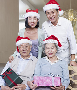 老香港摄影照片_亚洲家庭的圣诞帽