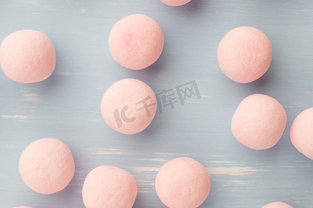 糖果吧摄影照片_糖果。小而圆的糖果色粉彩上柔和的背景.