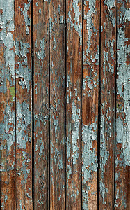 蓝色彩绘背景摄影照片_复古彩绘木背景纹理木风化质朴墙壁与剥离油漆。为复制旧木材纹理的空白空间。开裂的油漆有很多小裂缝, 抽象的垃圾纹理