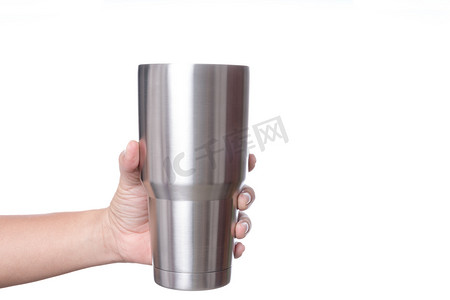 不锈钢背景摄影照片_手持不锈钢热水瓶, 用于保持温度, 如在白色背景下的热水结冰